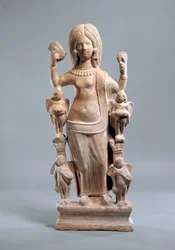 Statuetka kobiety (być może Wenus) trzymającej grzebień i lustro, III w. (terakota)